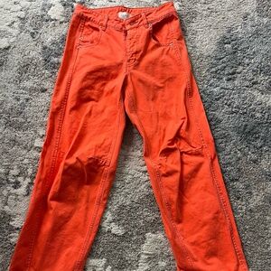 Low-rise orange jeans